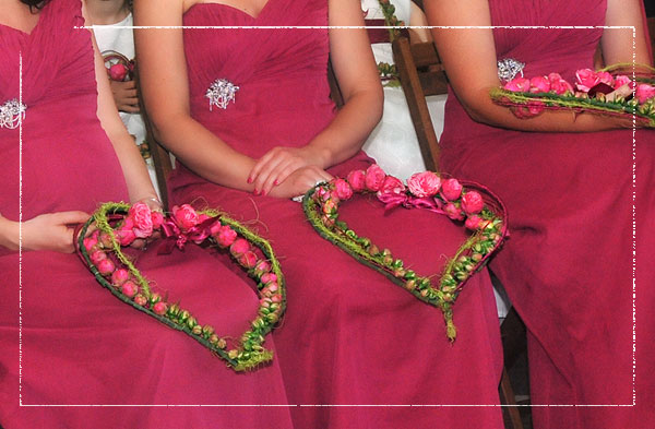  , have bridesmaids carry hearts made of ribbons and flowers or wood